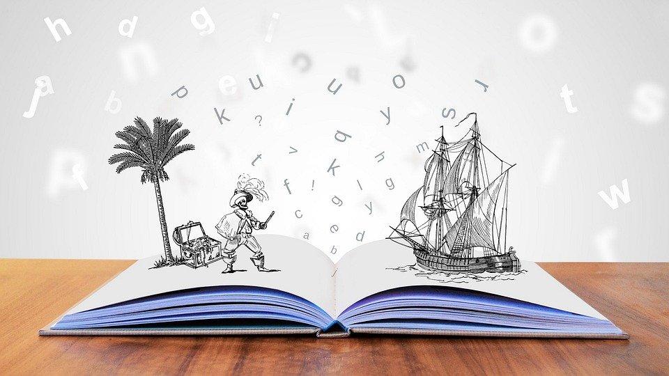 Image of a story book, with a pirate, a pirate ship and letters of the alphabet emerging from its pages