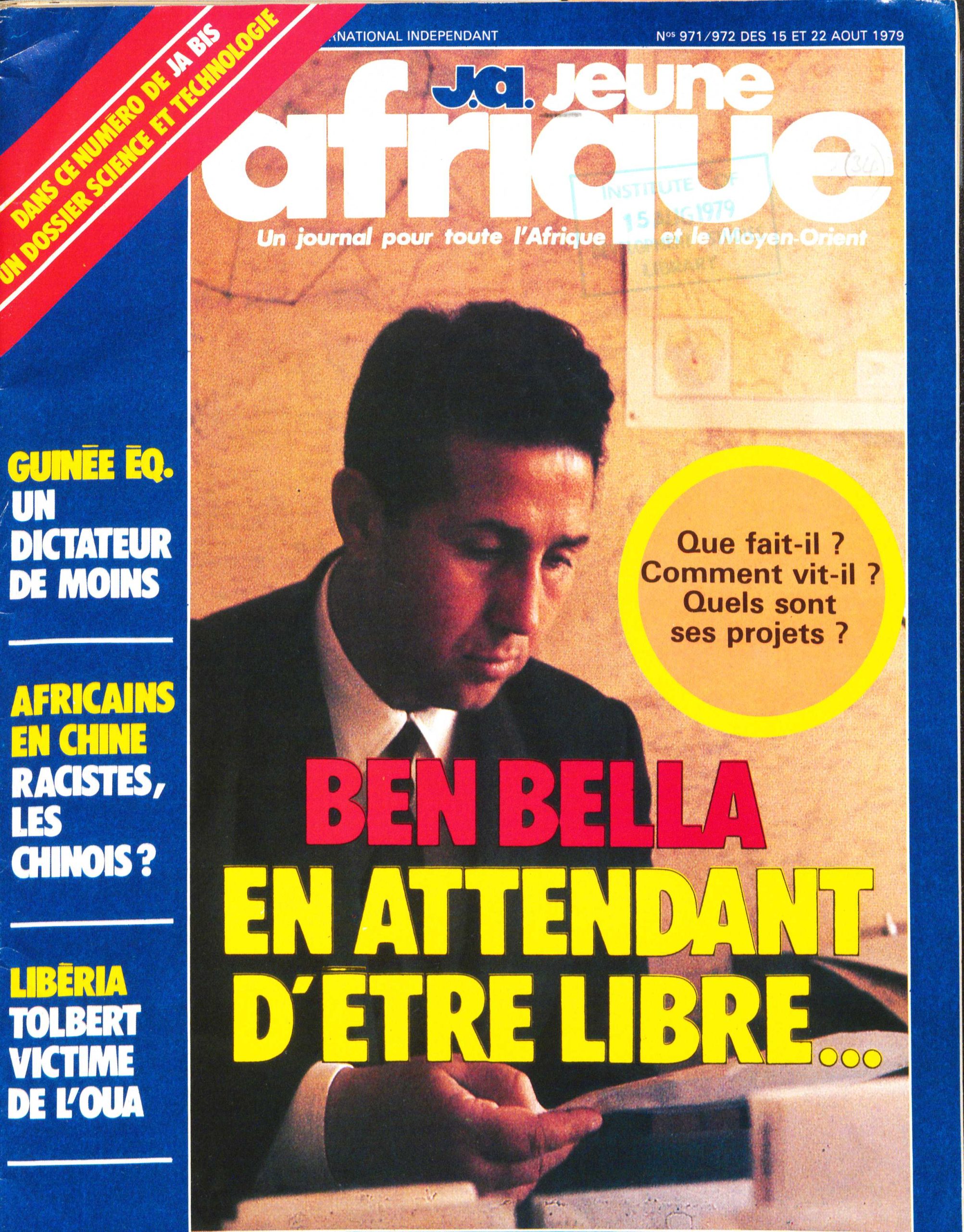 Image credit: Copyright (1979) Jeune Afrique Media Group. Front cover, Jeune Afrique, no. 971/972, Auguest 22. Accessed through the British Library for Development Studies Legacy Collection. Scan courtesy University of Sussex. All rights reserved. The cover of an issue of French periodical Jeune Afrique from 1979 with a shot of Ahmed Ben Bella, sitting down, wearing a suit, and looking at a document. The headline says that Ben Bella is waiting for freedom, and the cover has a textbox rhetorically asking what Ben Bella is doing, how he lives, and what he has planned.